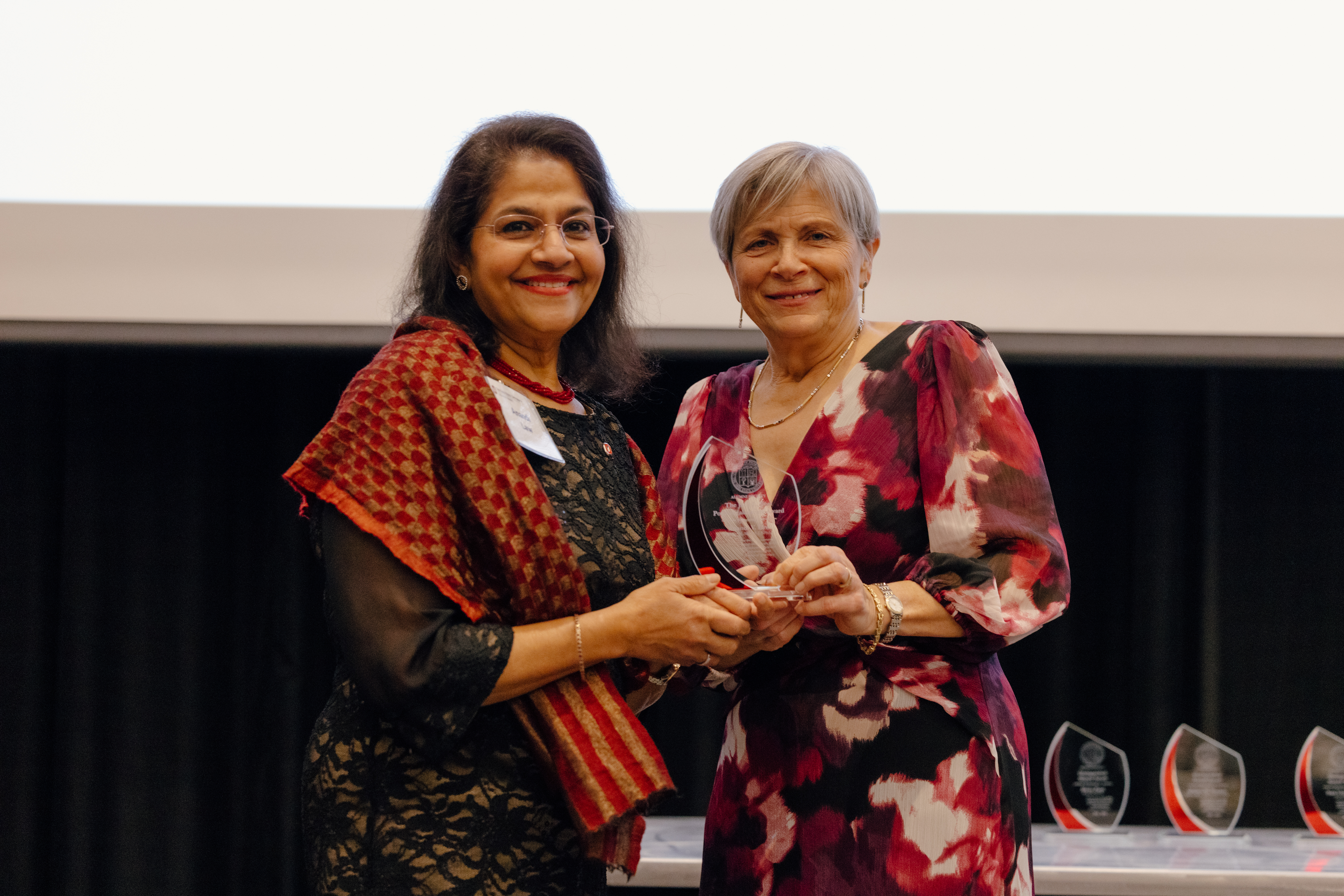 Dr. Law and Dean Deanna Kroetz presenting the Jack L. Beal Post-Baccalaureate Award