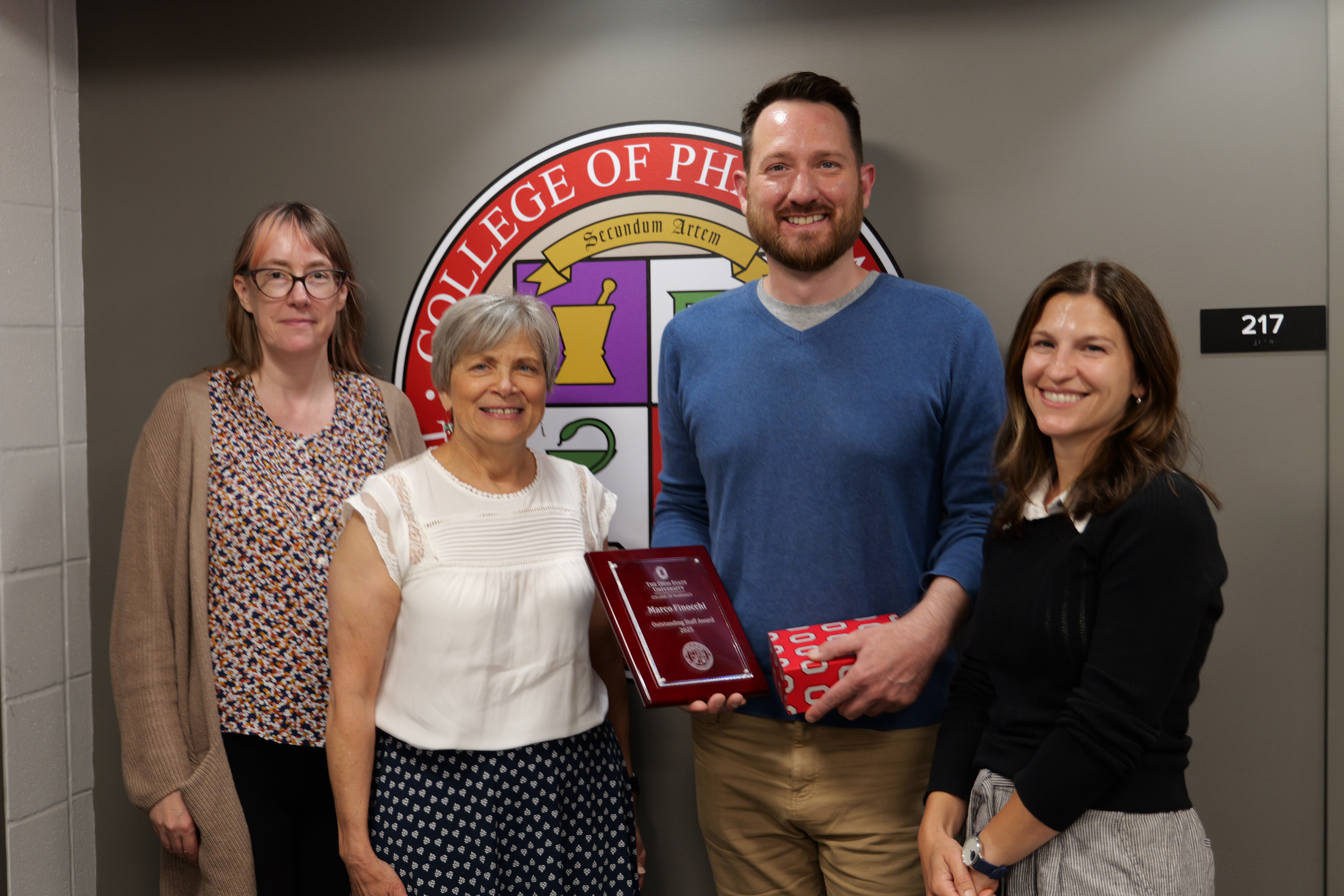 Marco Finocchi receiving the Staff Excellence Award
