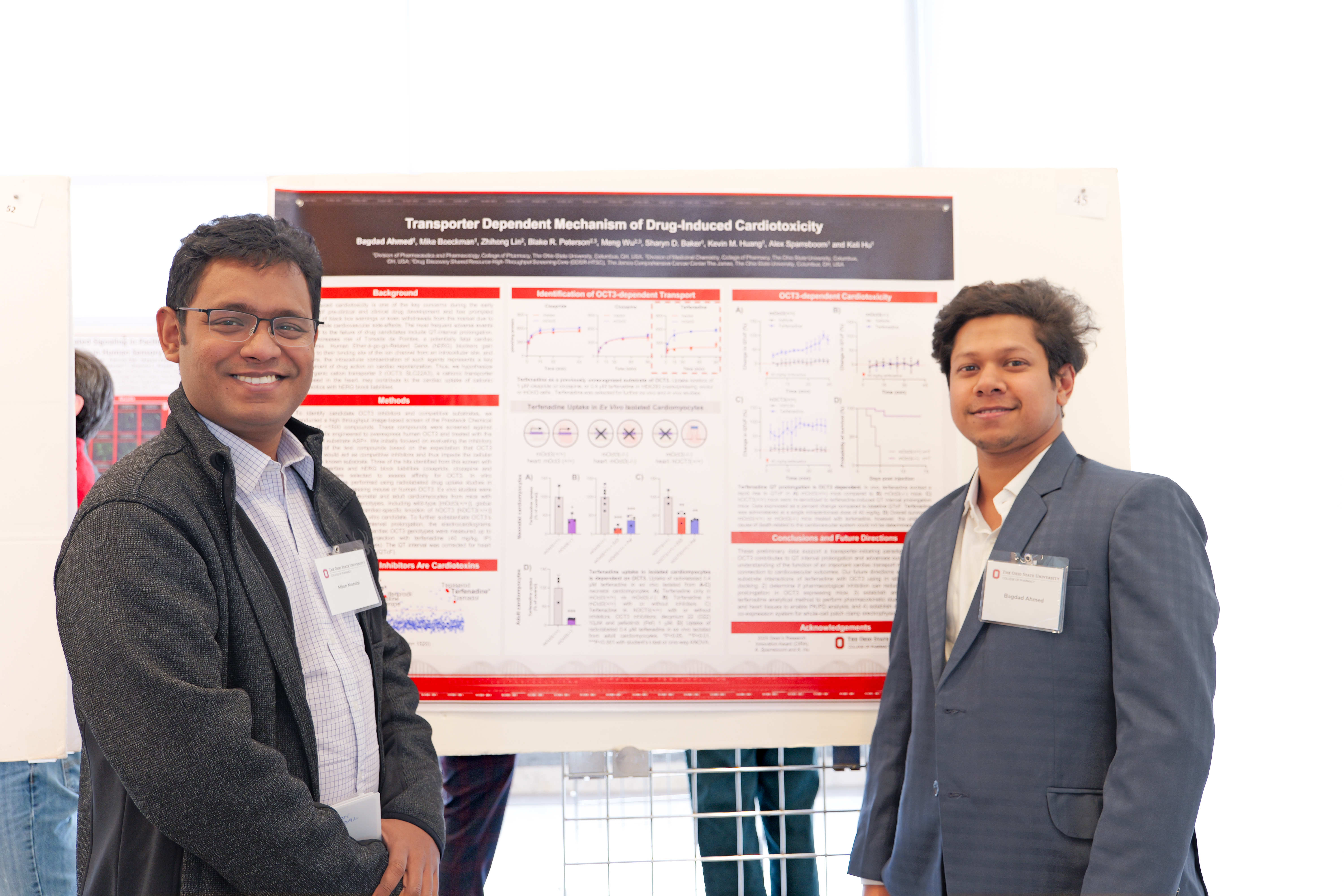 Mondal (left) and research partner in front of their research poster