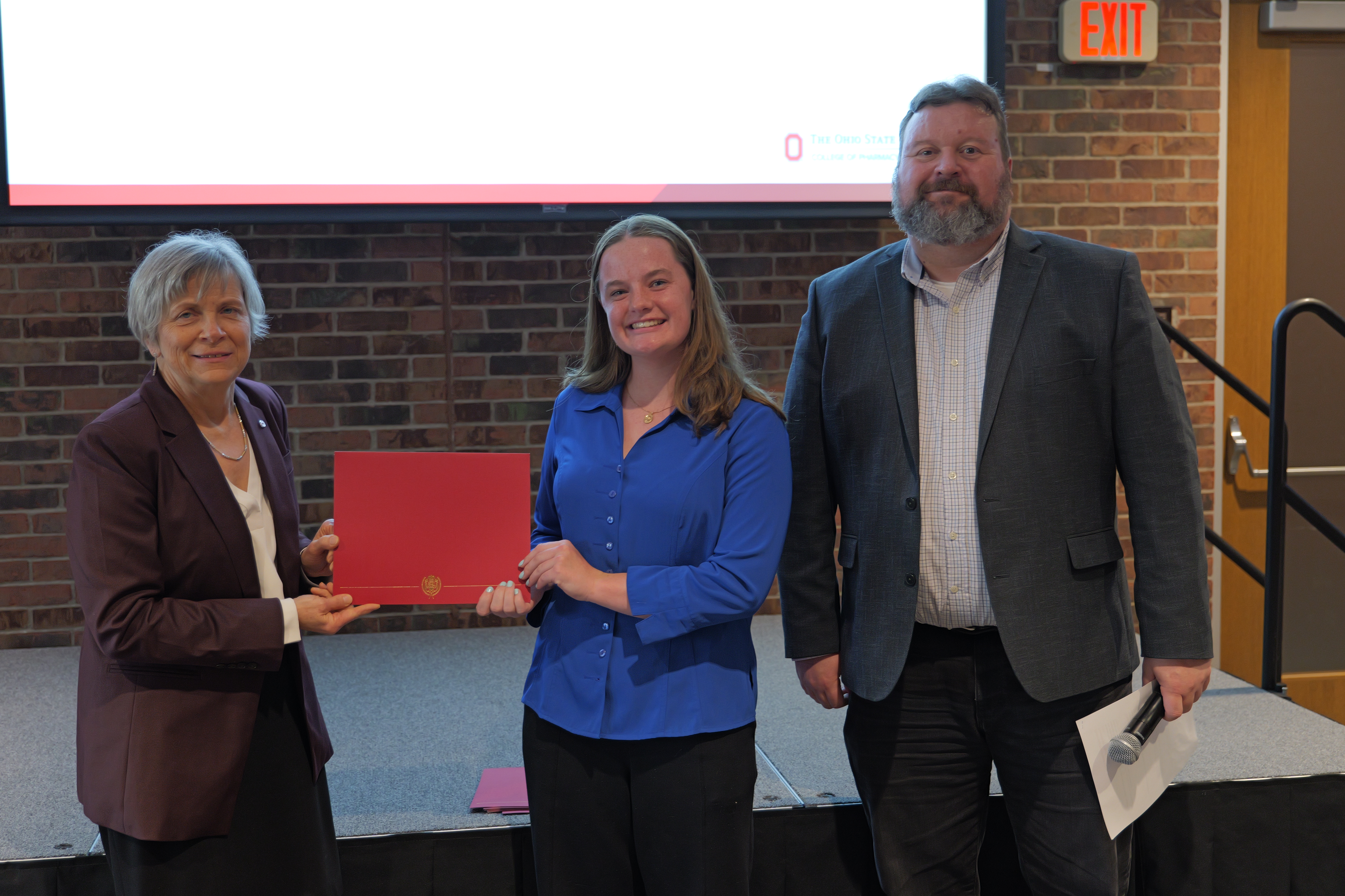 Kaitlyn with her certificate 