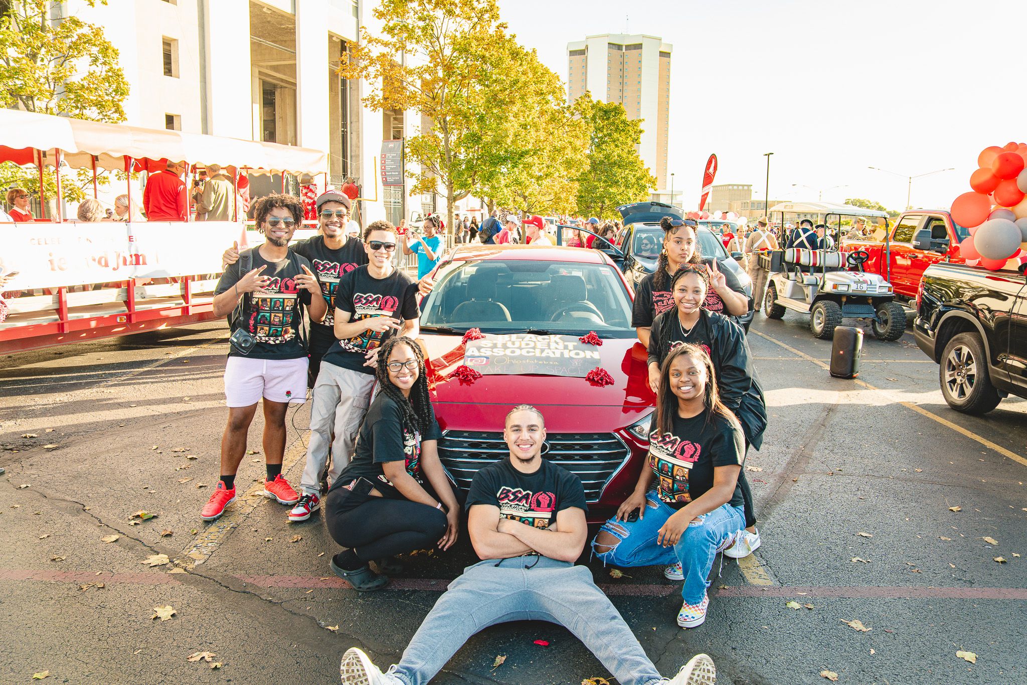 Black Student Association posing with their Homecoming parade float