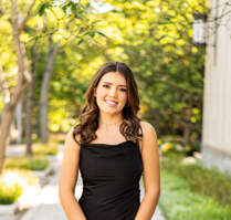 a person posing outside
