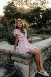 a person posing outside