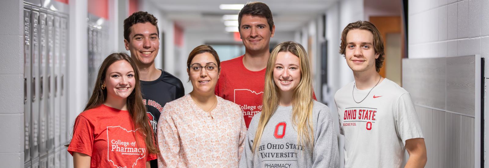 a group of students posing in a hallway