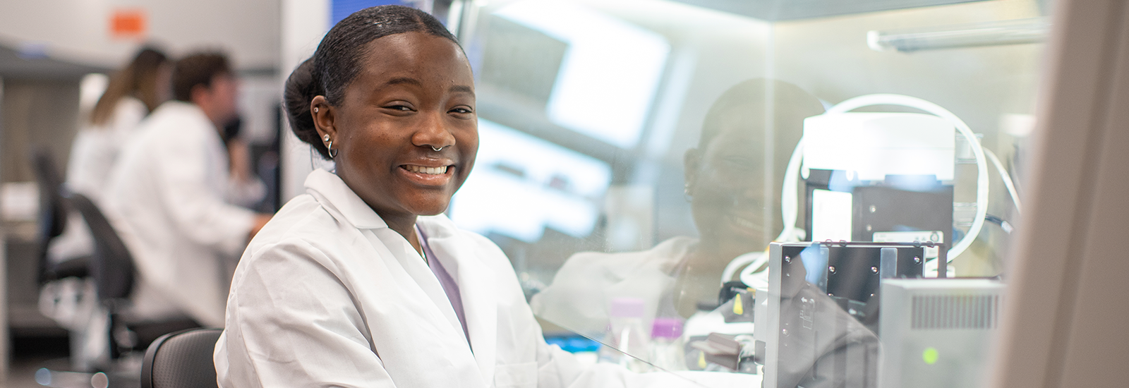 African American pharmacist in lab