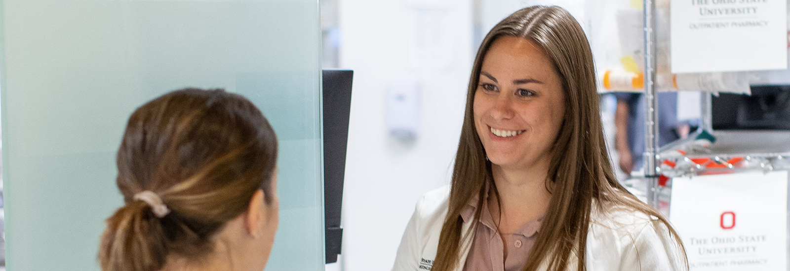 Student with pharmacy patient