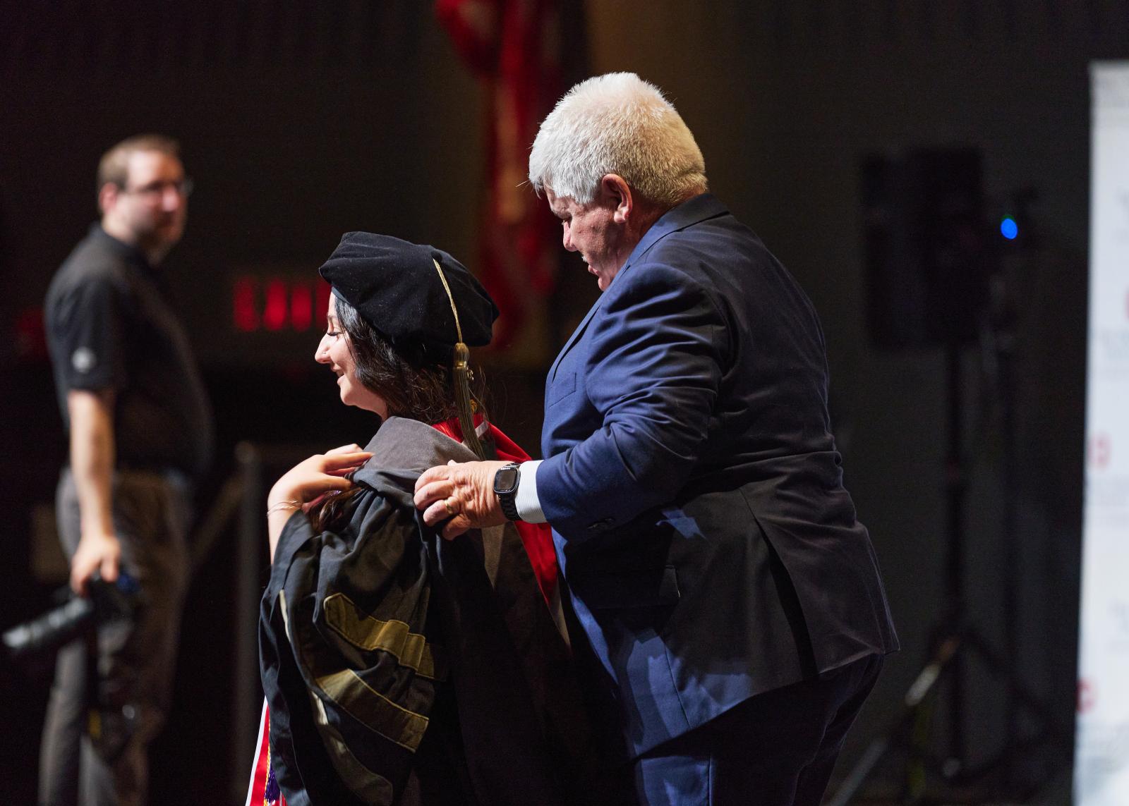 Bethany being hooded by Michael Clotz