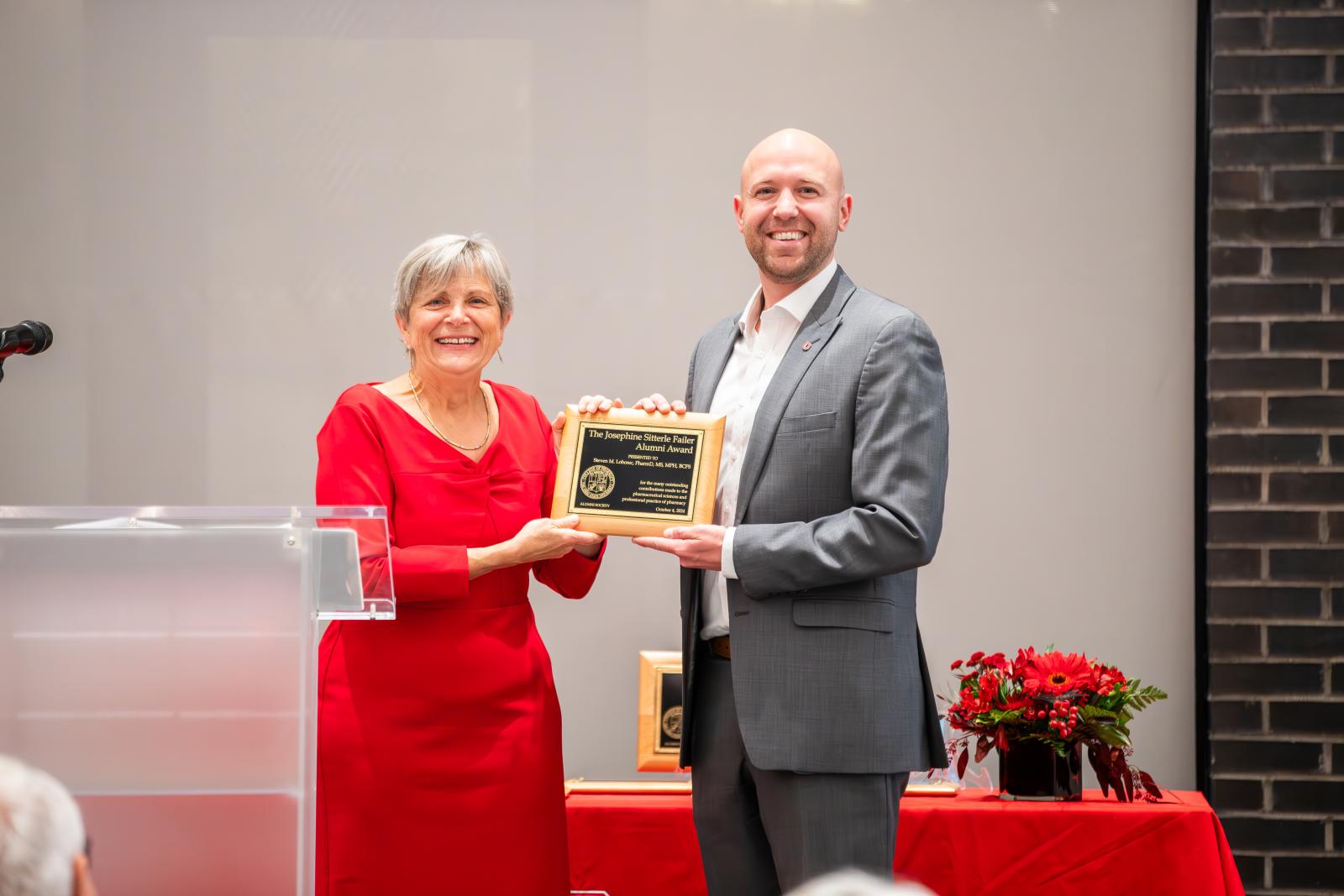 Steven Loborec accepting award