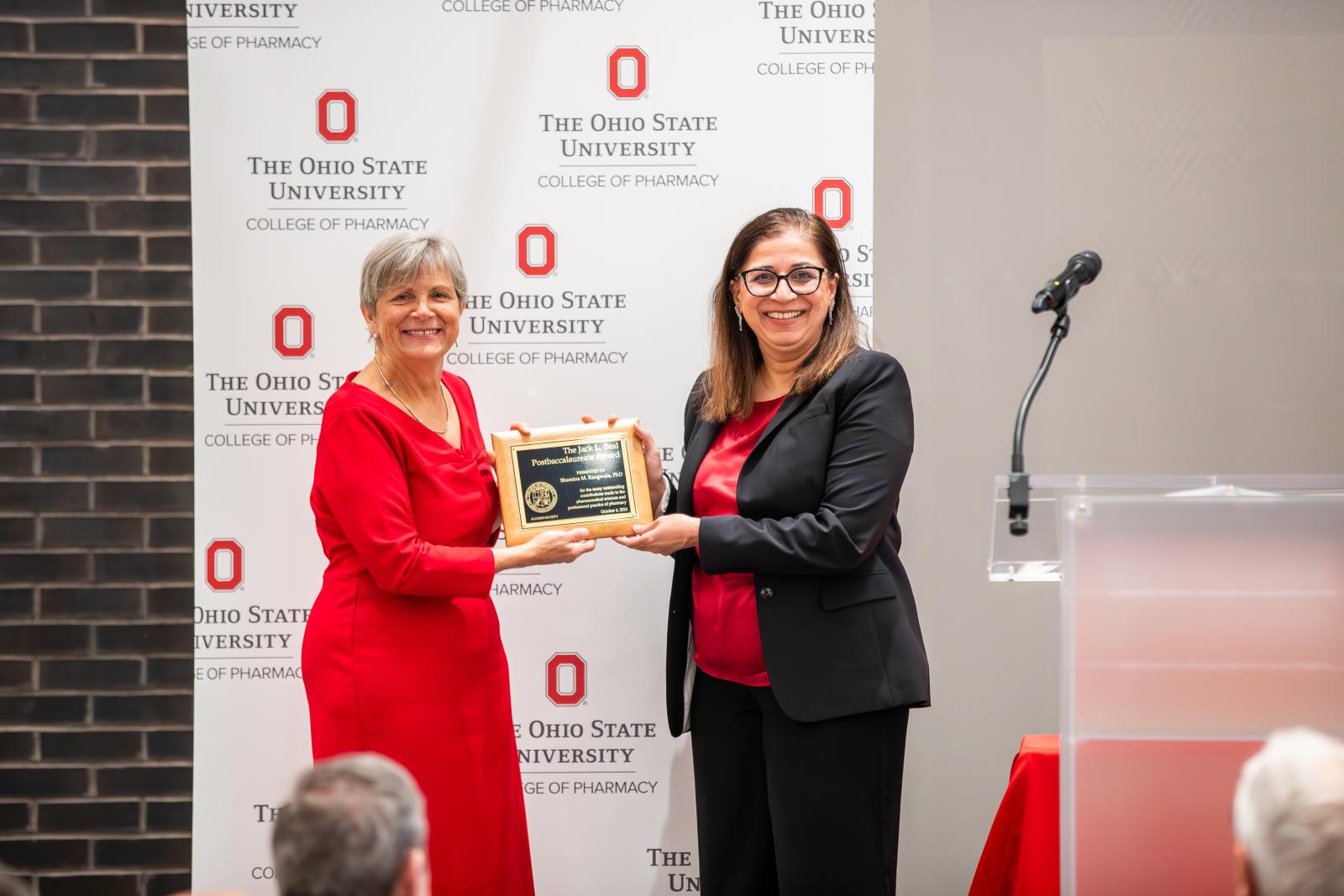 Shamina Rangwala accepting award