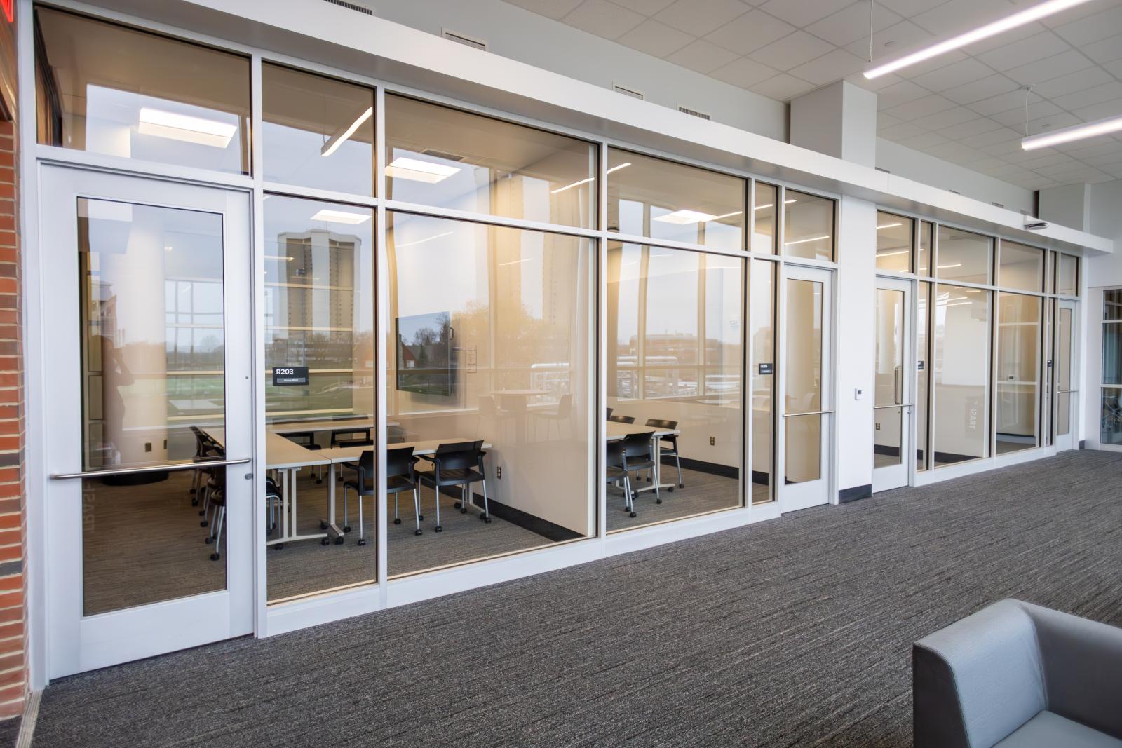 Exterior of three study rooms with seating