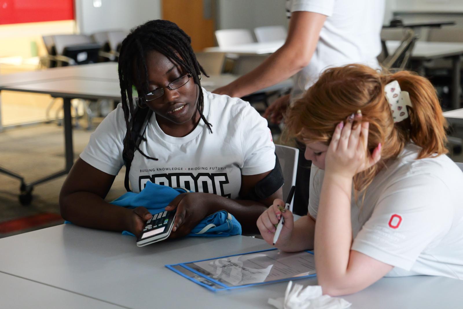 Students solving problems in BridgeRx escape room