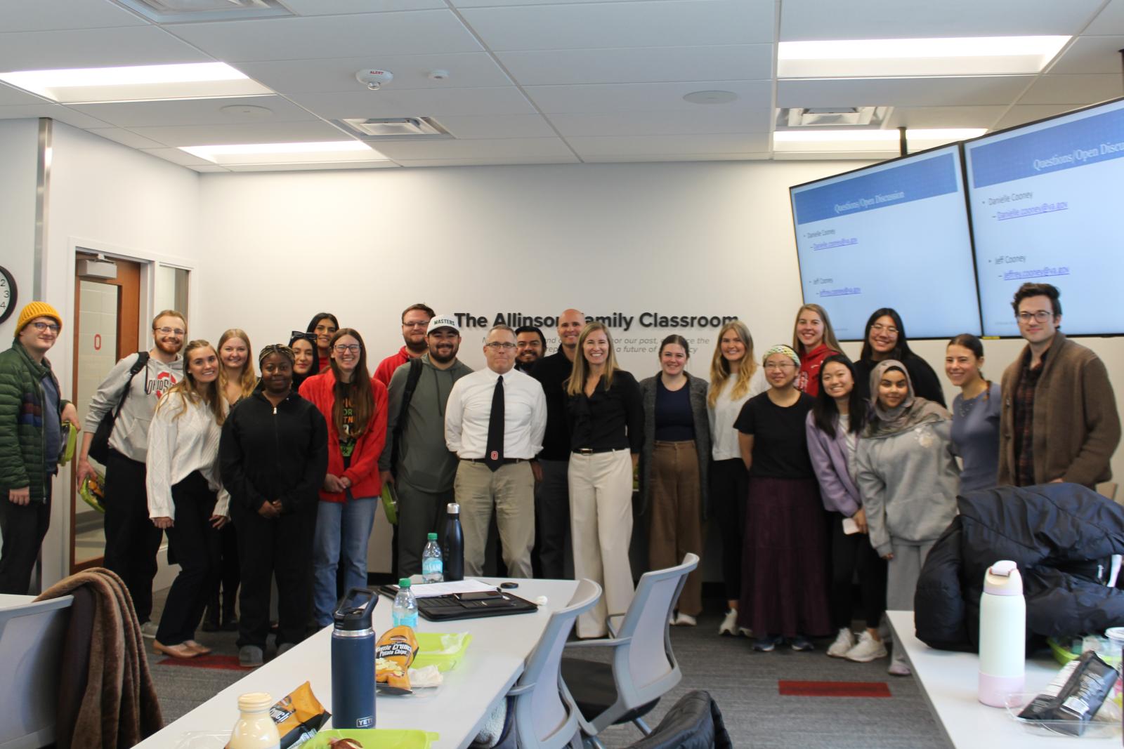 Dr. Jeff and Dr. Danielle Cooney with students.