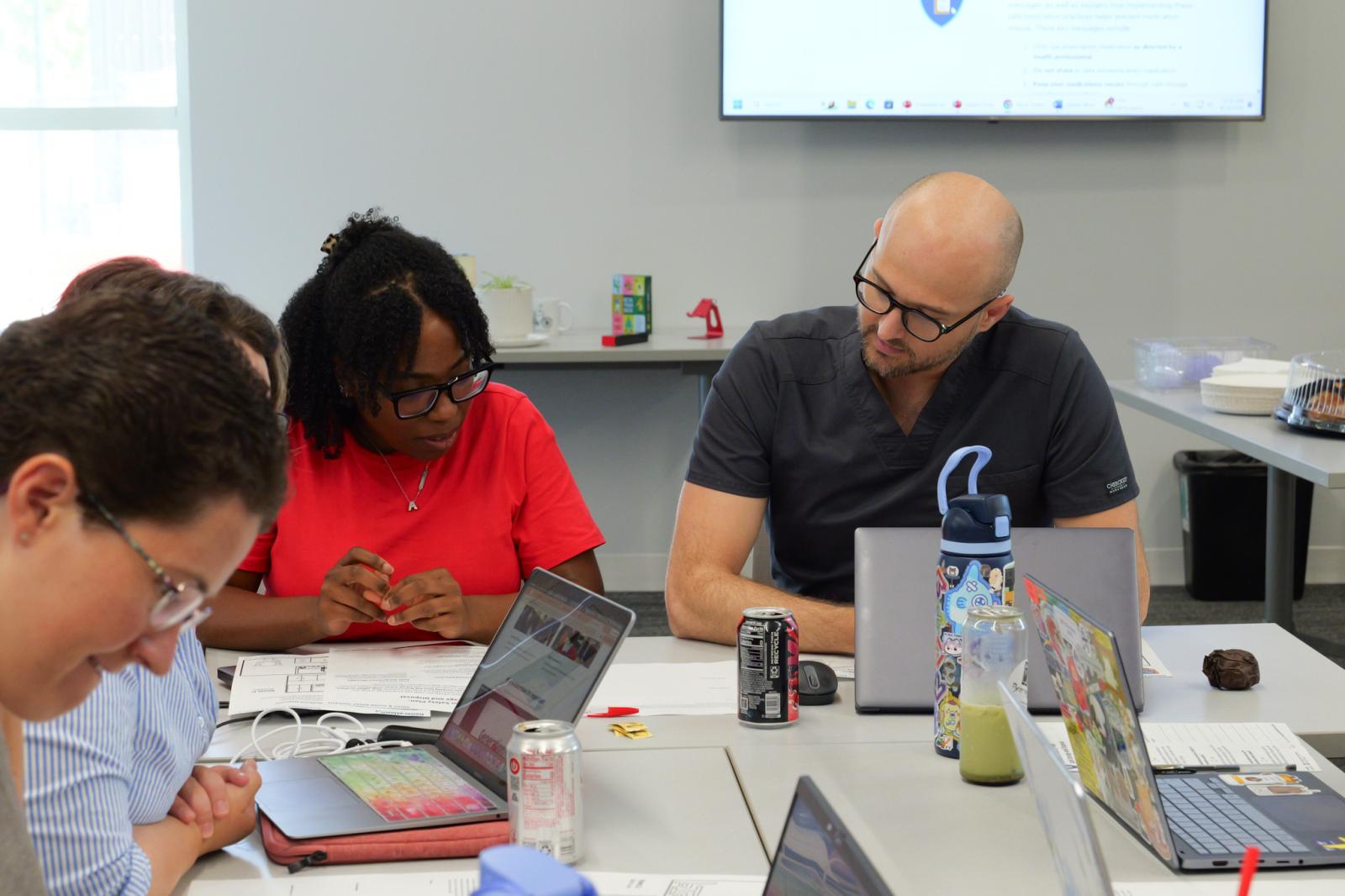 Two individuals working on a project