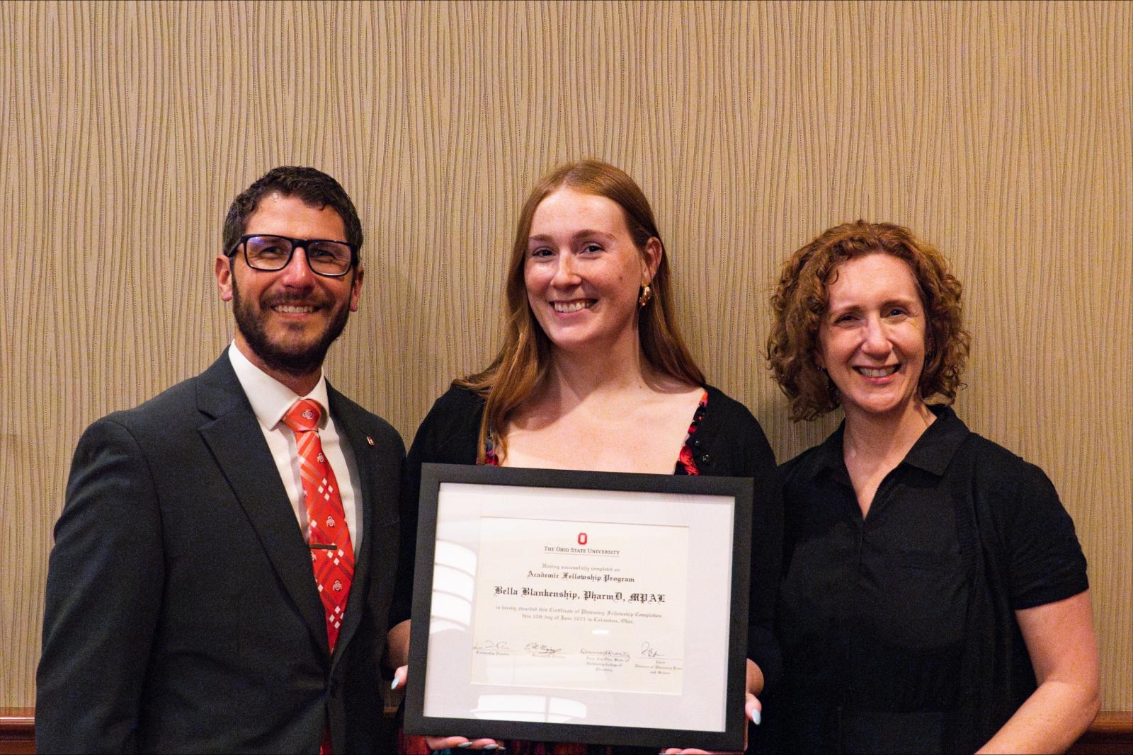 Drs. E. Michael Murphy, Bella Blankenship and Jen Rodis at Dr. Blankenship's fellowship recognition ceremony