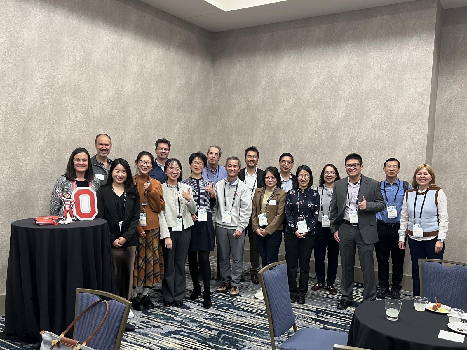 A group photo of the graduate program alumni