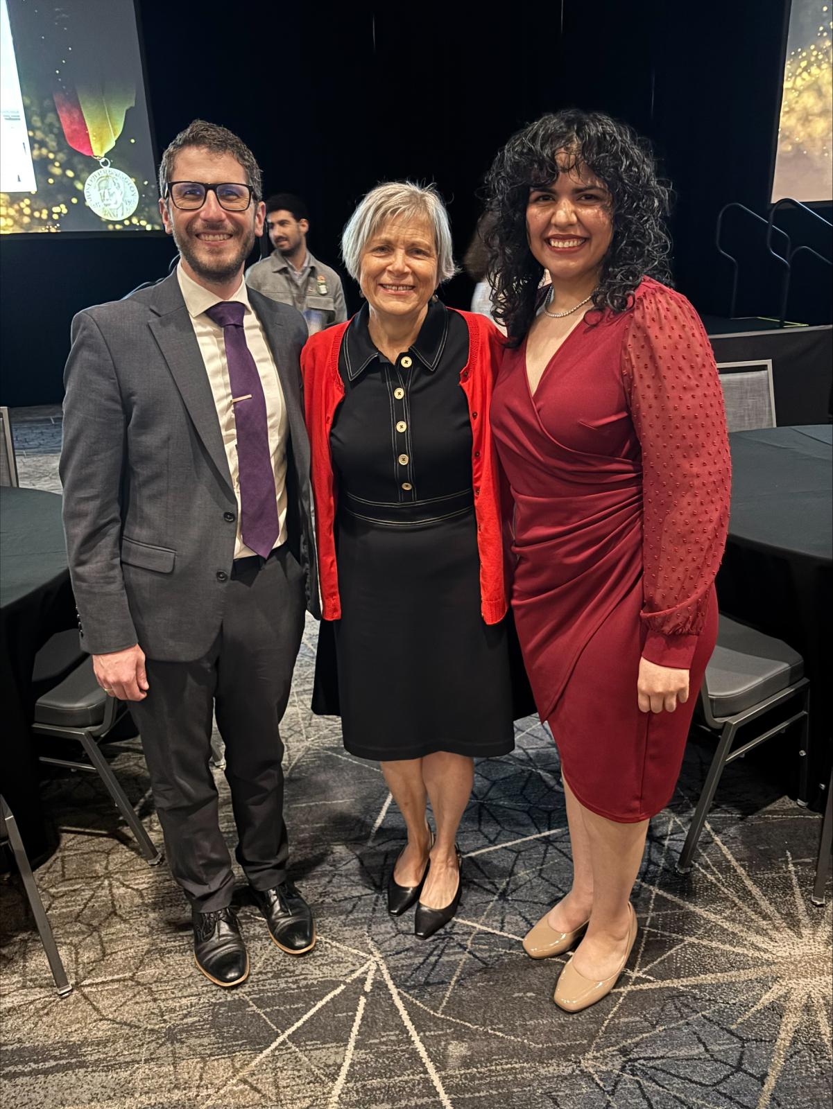  Lyuba Benin in front of her poster 