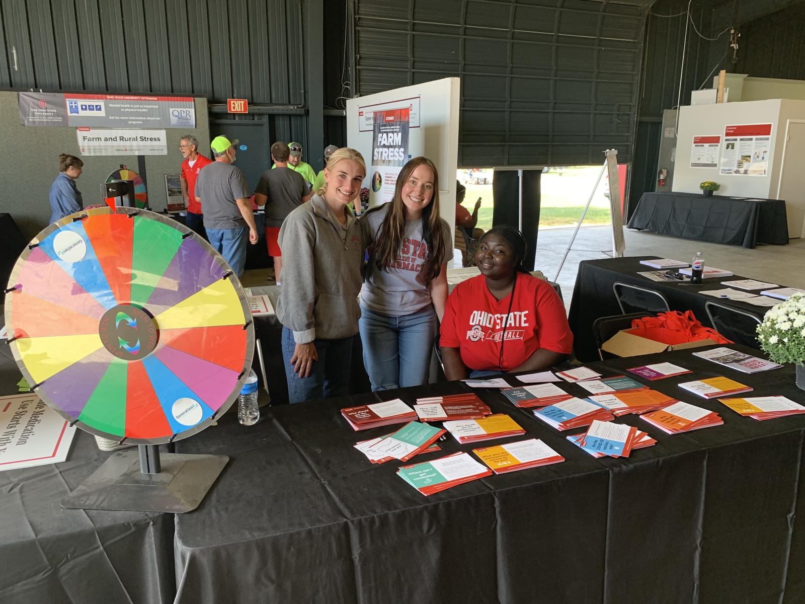 PharmD students utilizing toolkit materials at 2023 Farm Science Review