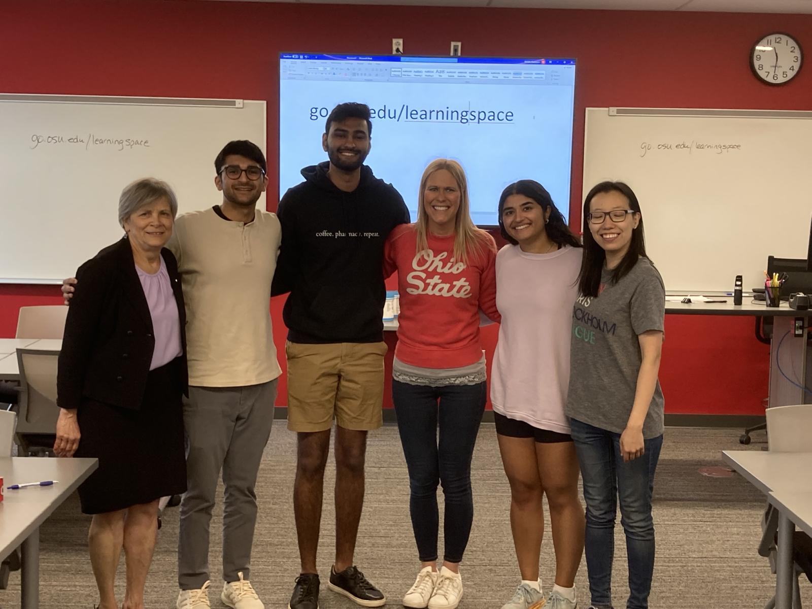 Dr. Dula with Dean Deanna Kroetz (leftmost) and P1 students