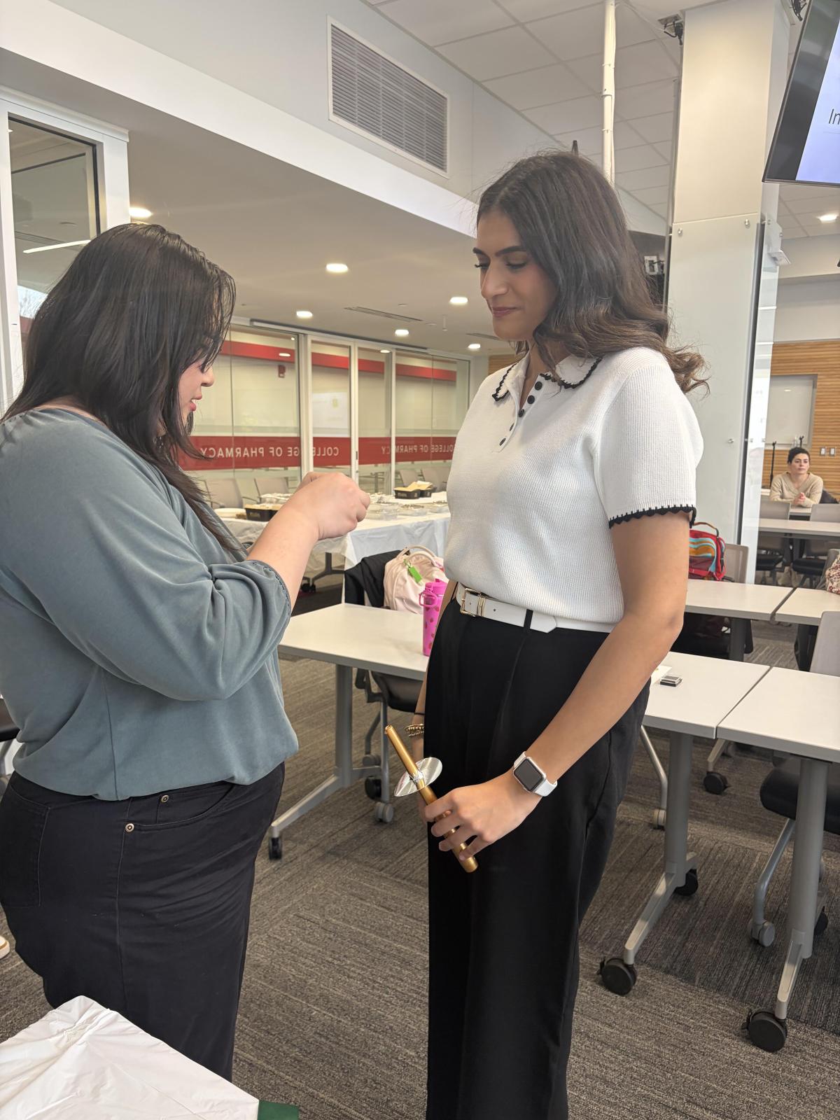 New member receiving pin