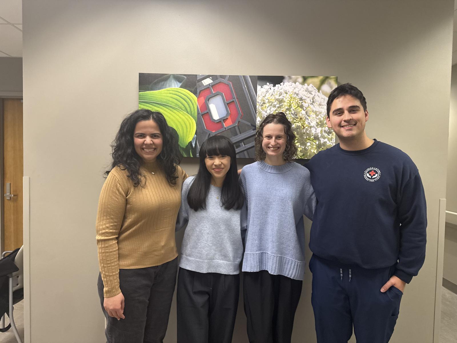 Dr. Shaw Ojeda and her student team smiling 