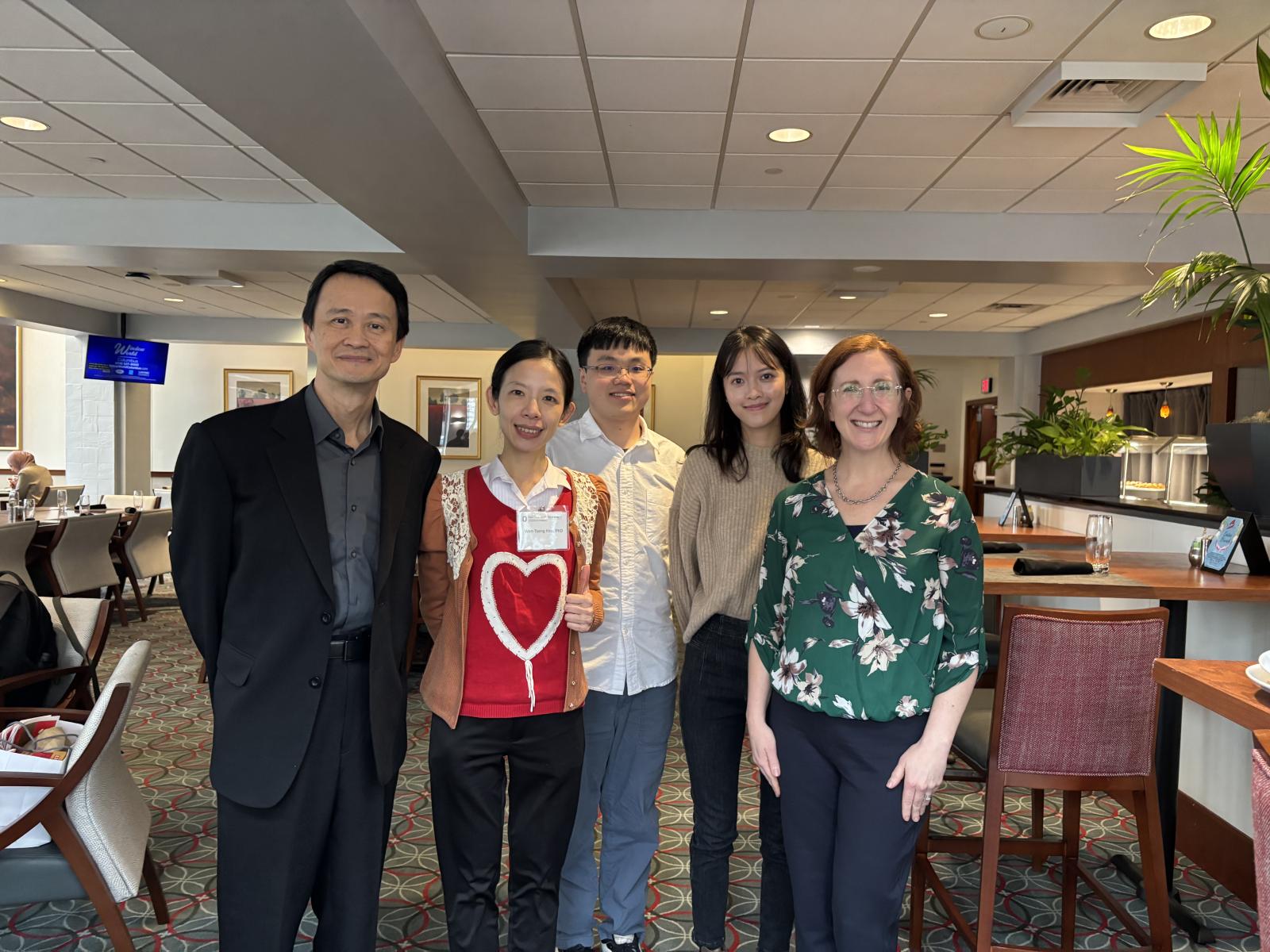 A photo of NTU faculty and dean with Dr. Rodis