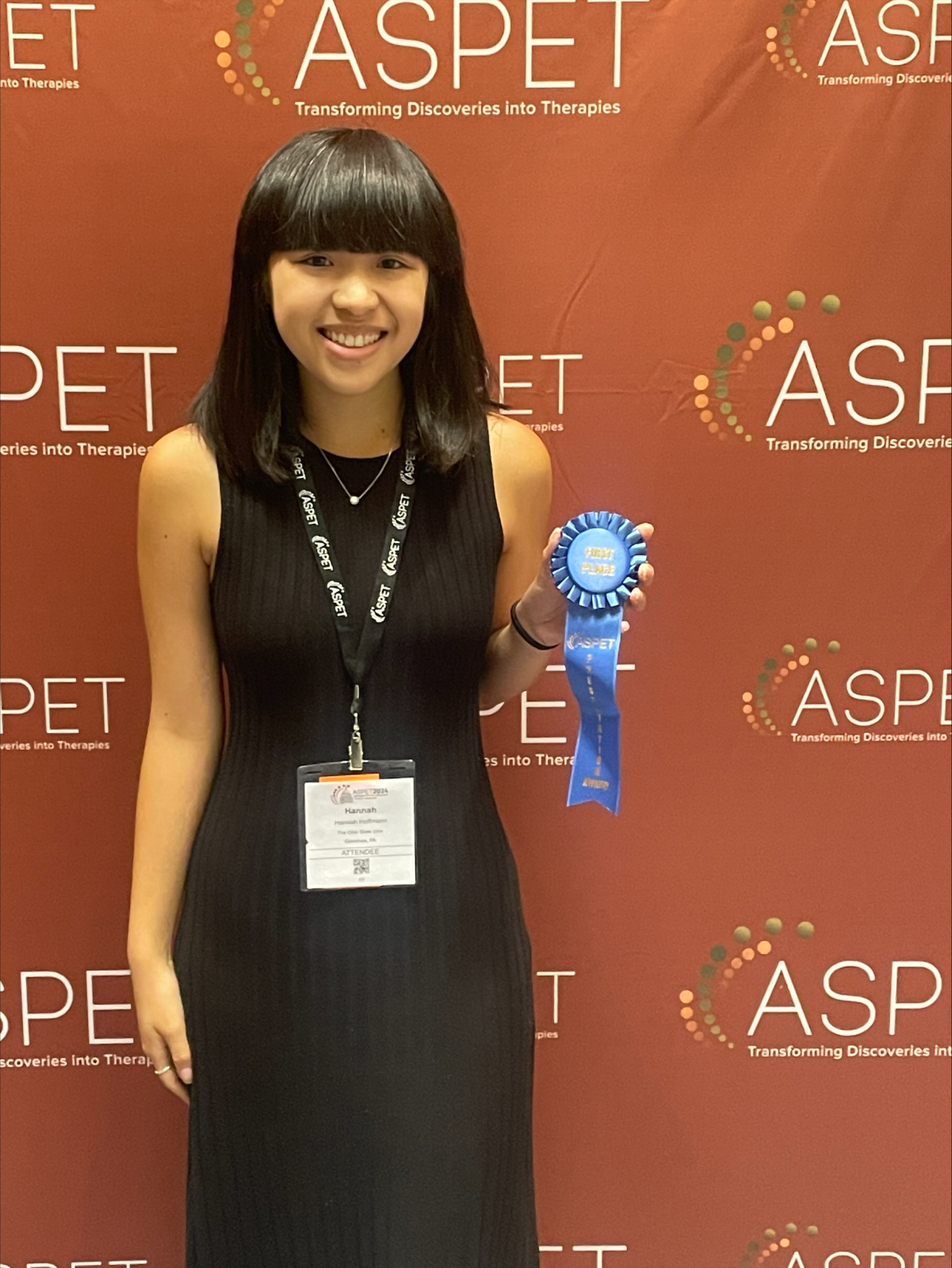 Hoffmann after receiving first place in the Division of Pharmacology Education Student Poster Competition with her research poster, "Equitable Impacts of Coaching Reports on Undergraduate Students Self-Directed Learning and Pharmaceutical Science Exam Per