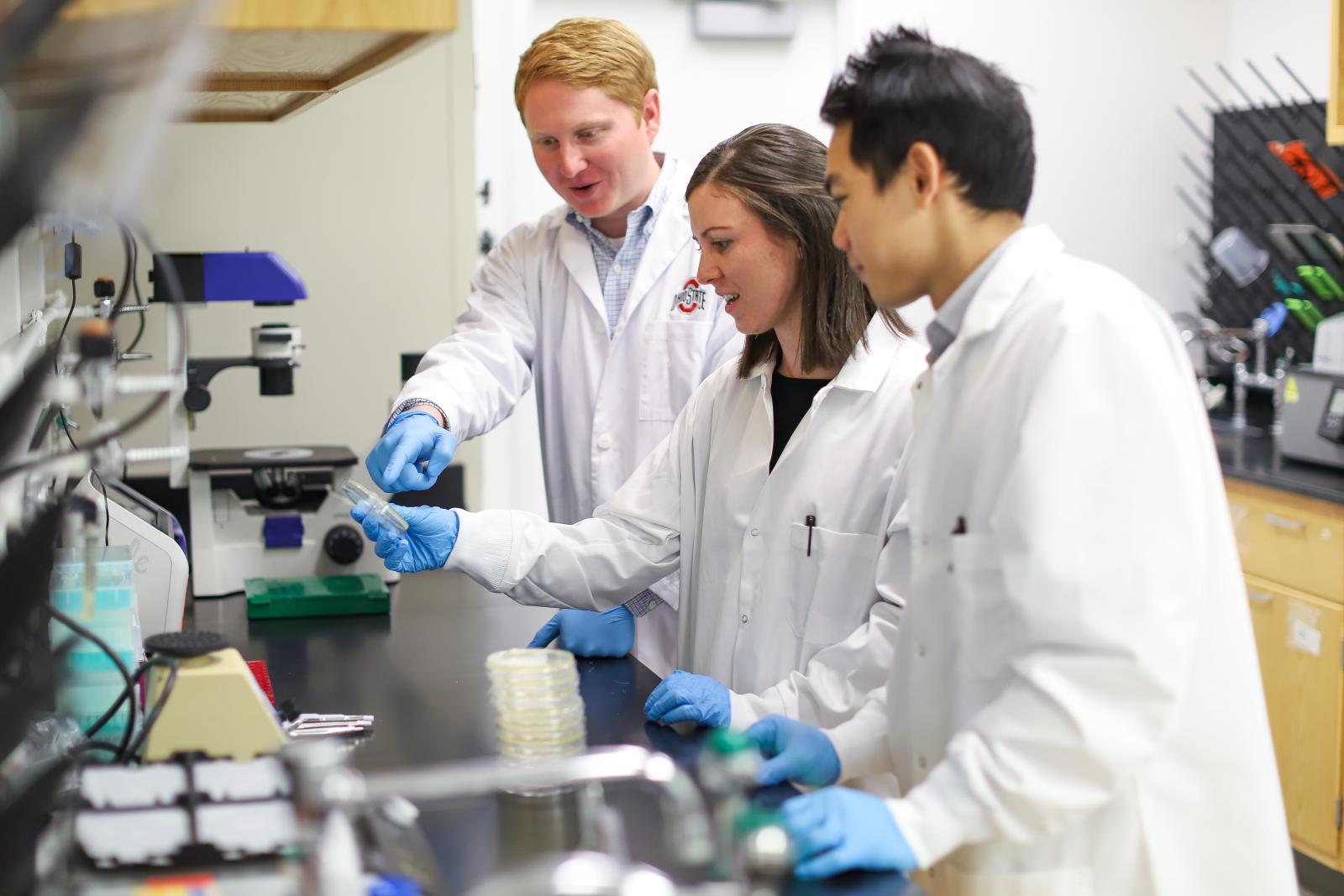 three student researchers