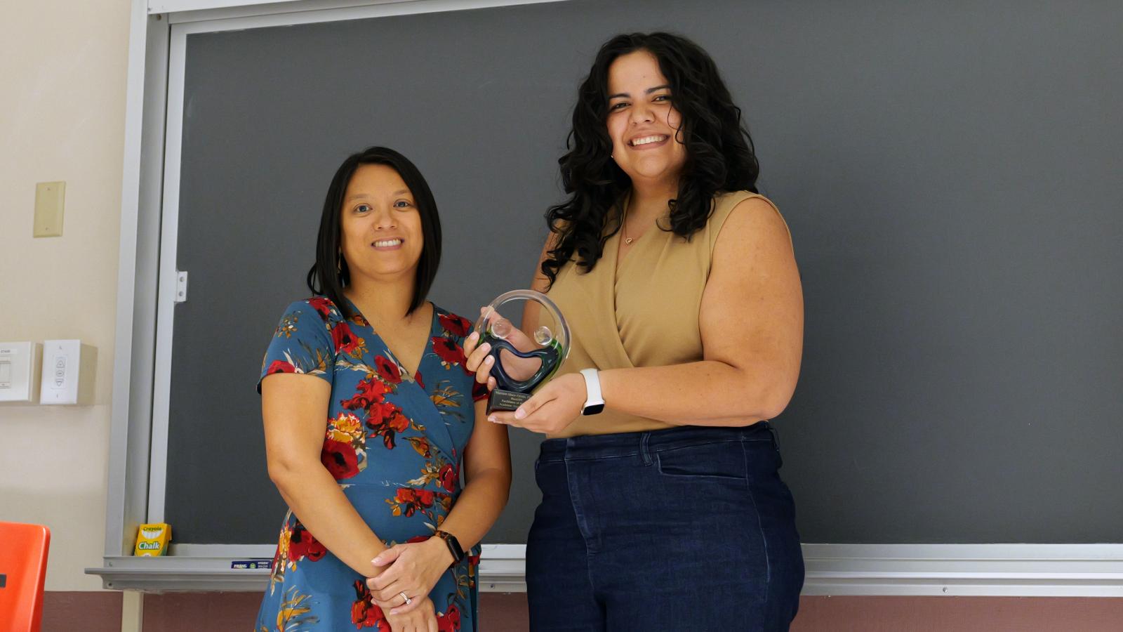 Myriam receiving IPE award