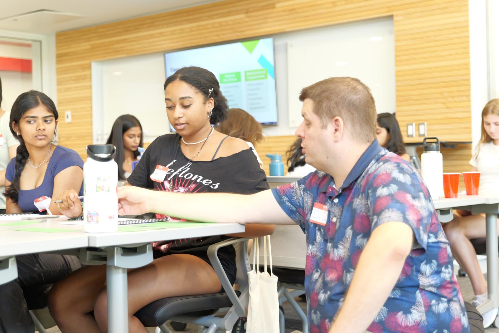 Co-Director Dan Michel, PhD works with a PPP student