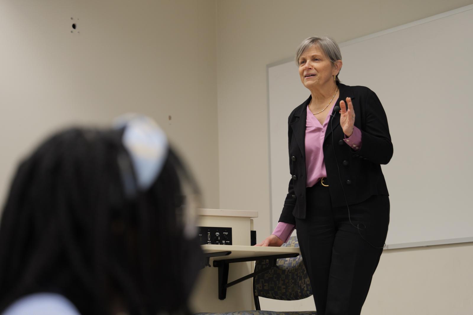 dean kroetz speaking to pharmacy council in a lecture hall