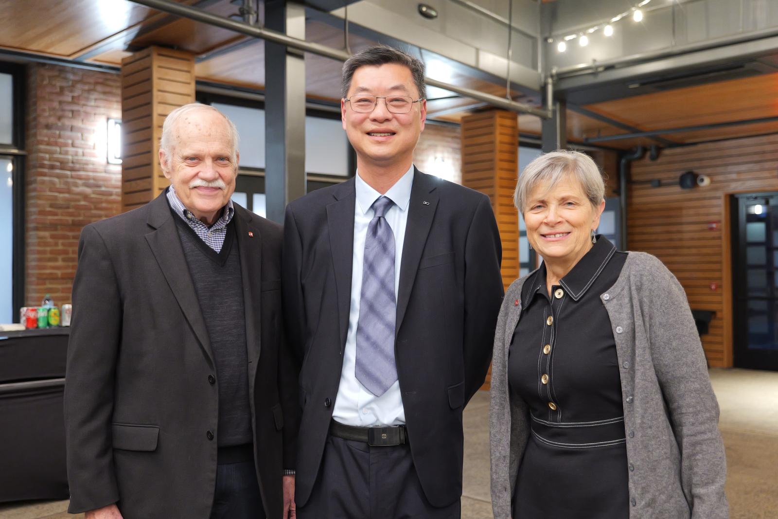 Dr. Lee with current and former Dean's. 