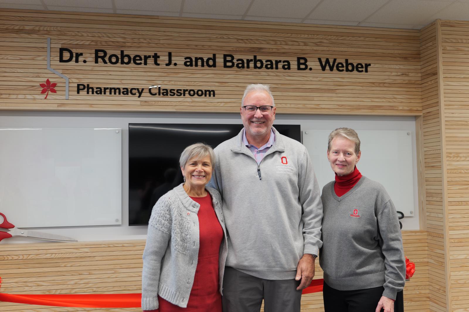 Dean Kroetz, Dr. Weber, and Mrs. Weber