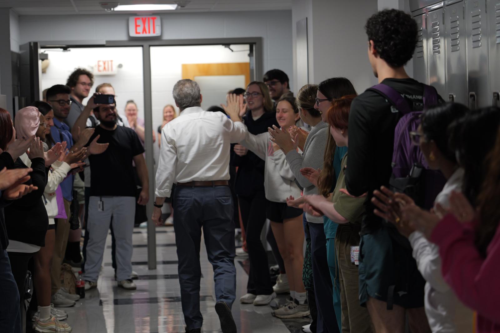 Dr. McAuley walking down the hall.