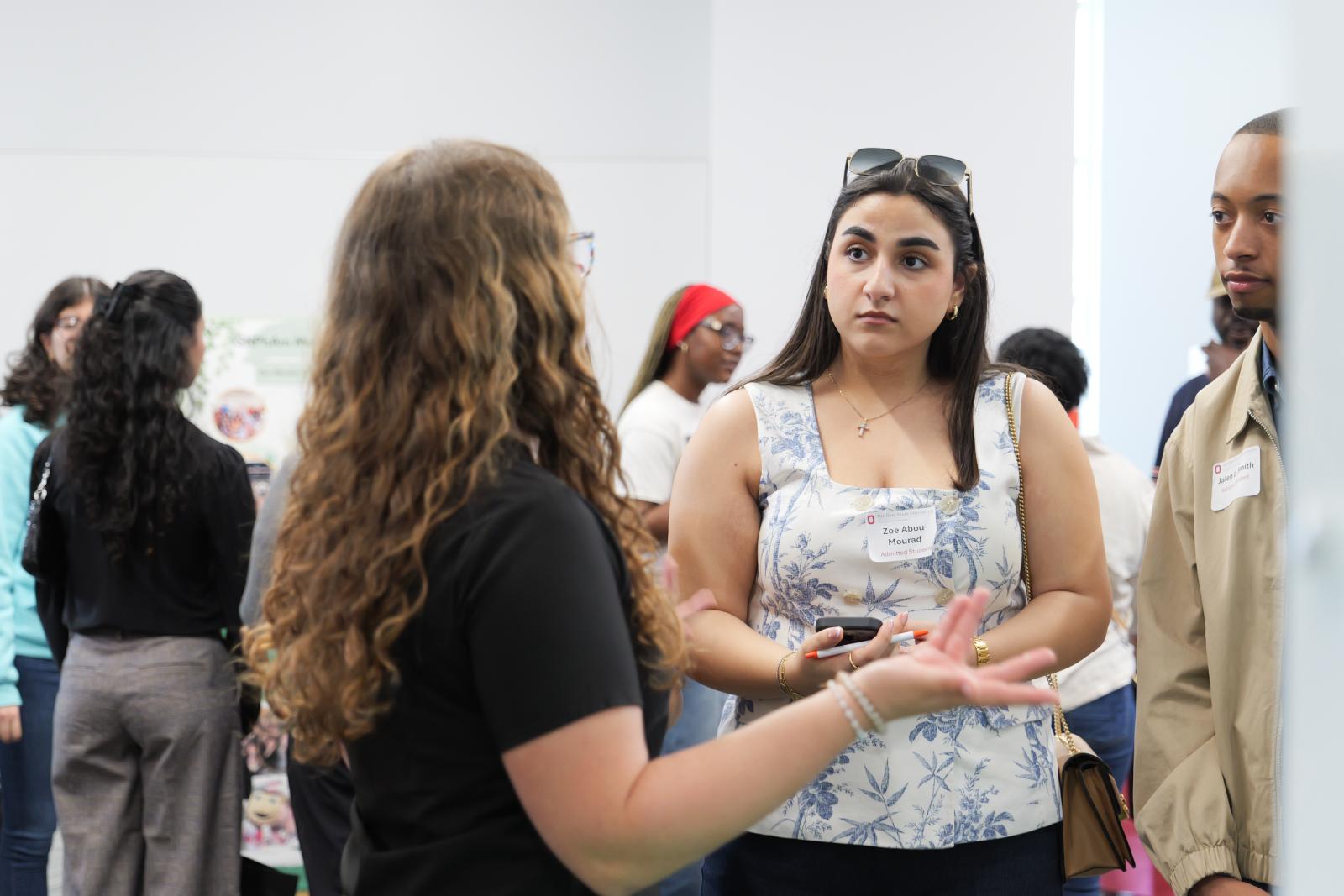 An admitted student talking to a current student