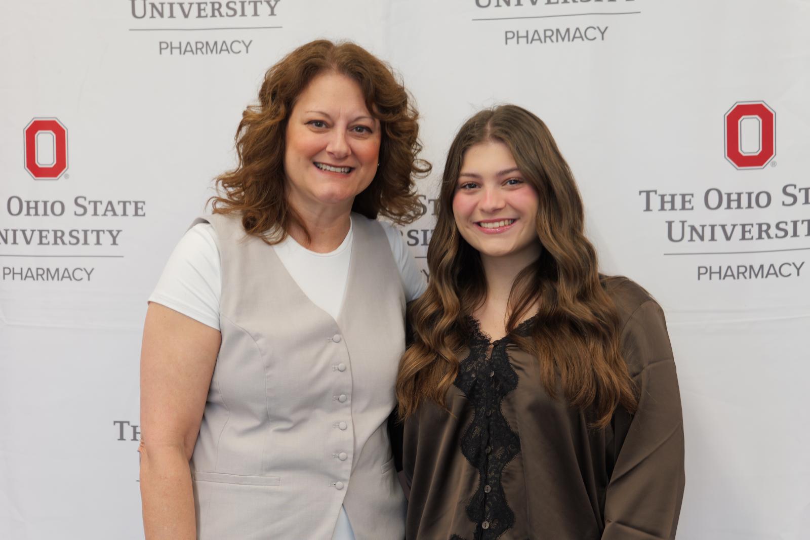 A mother and her daughter who is graduating