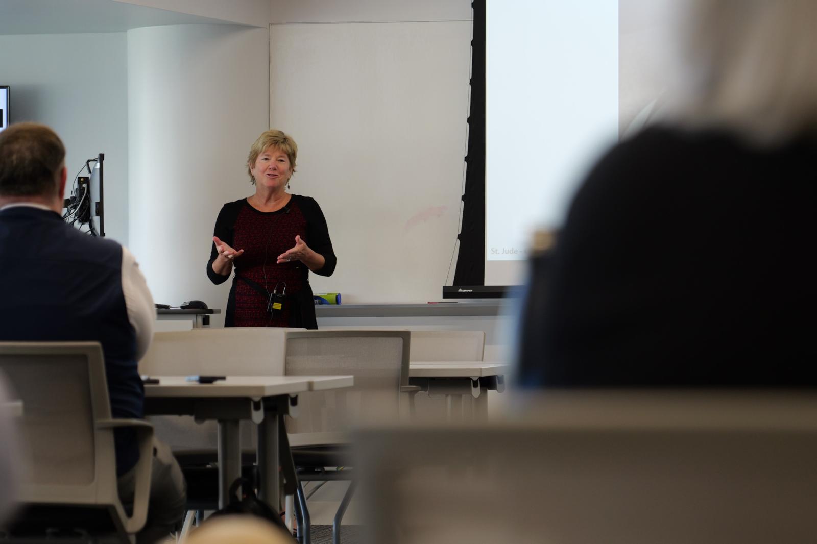 Dr. Relling giving her lecture