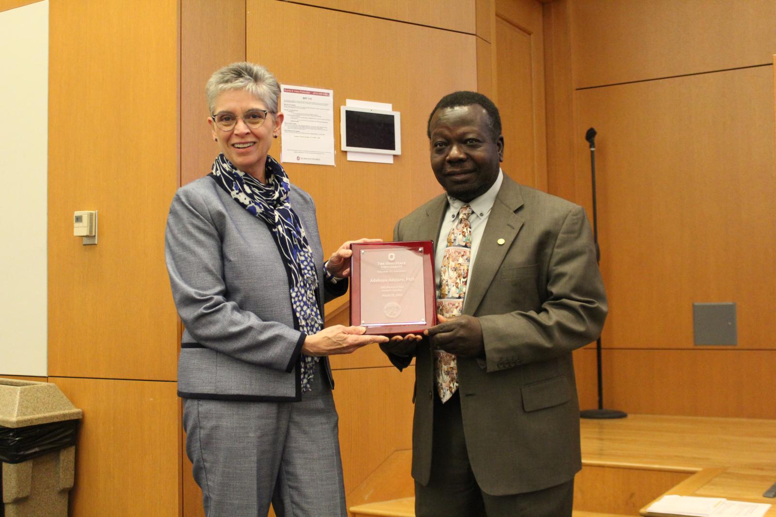 Dr. Cynthia Carnes with Dr. Adeboye Adejare