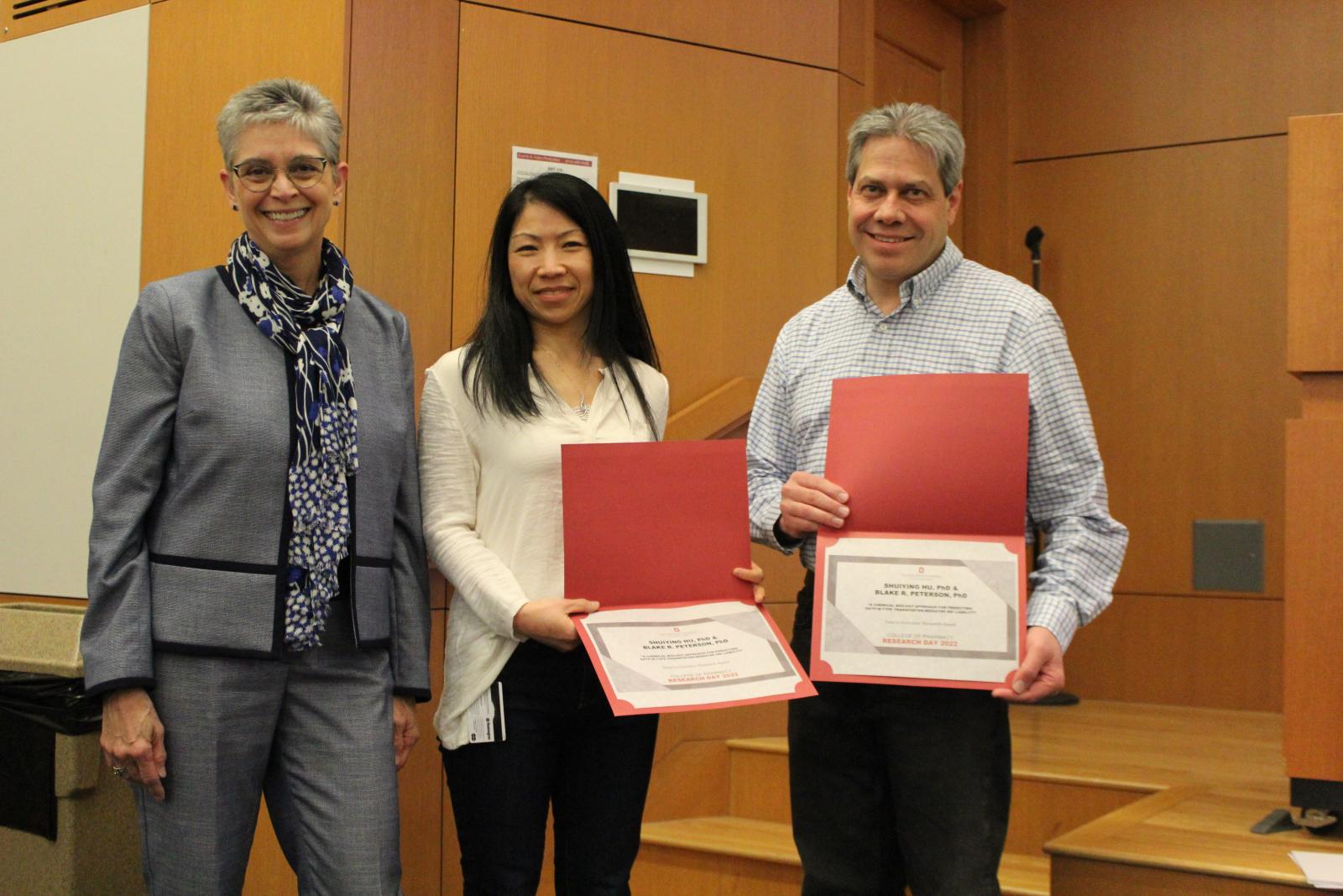 Dr. Cynthia Carnes with Drs. Shuiying Hu and Blake Peterson