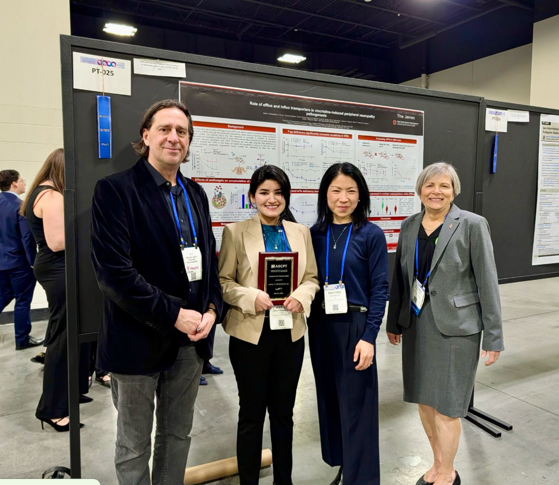 Award winner with dean and colleagues 