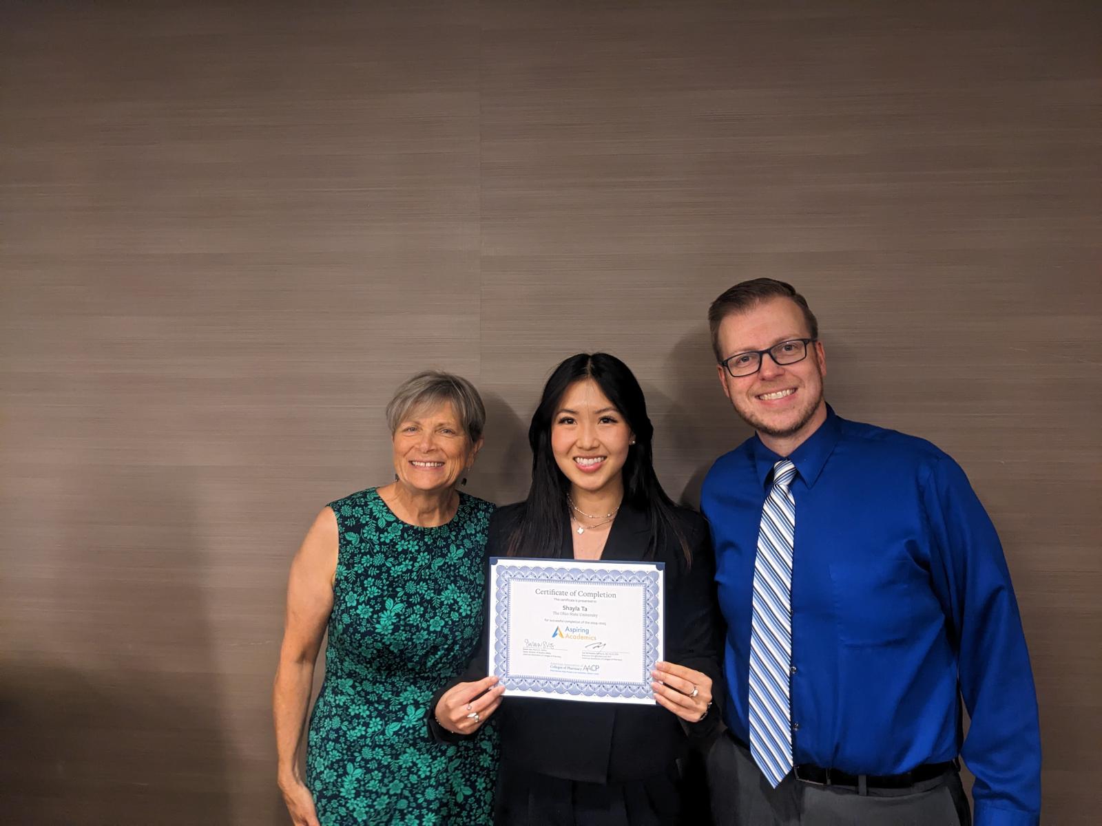 Shayla Ta with Dean Deanna Kroetz and Assistant Dean of PharmD Studies, David Matthews