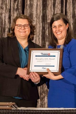 Dr. Anna Gehres receiving her award