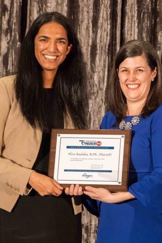 Dr. Nira Kadakia receiving her award