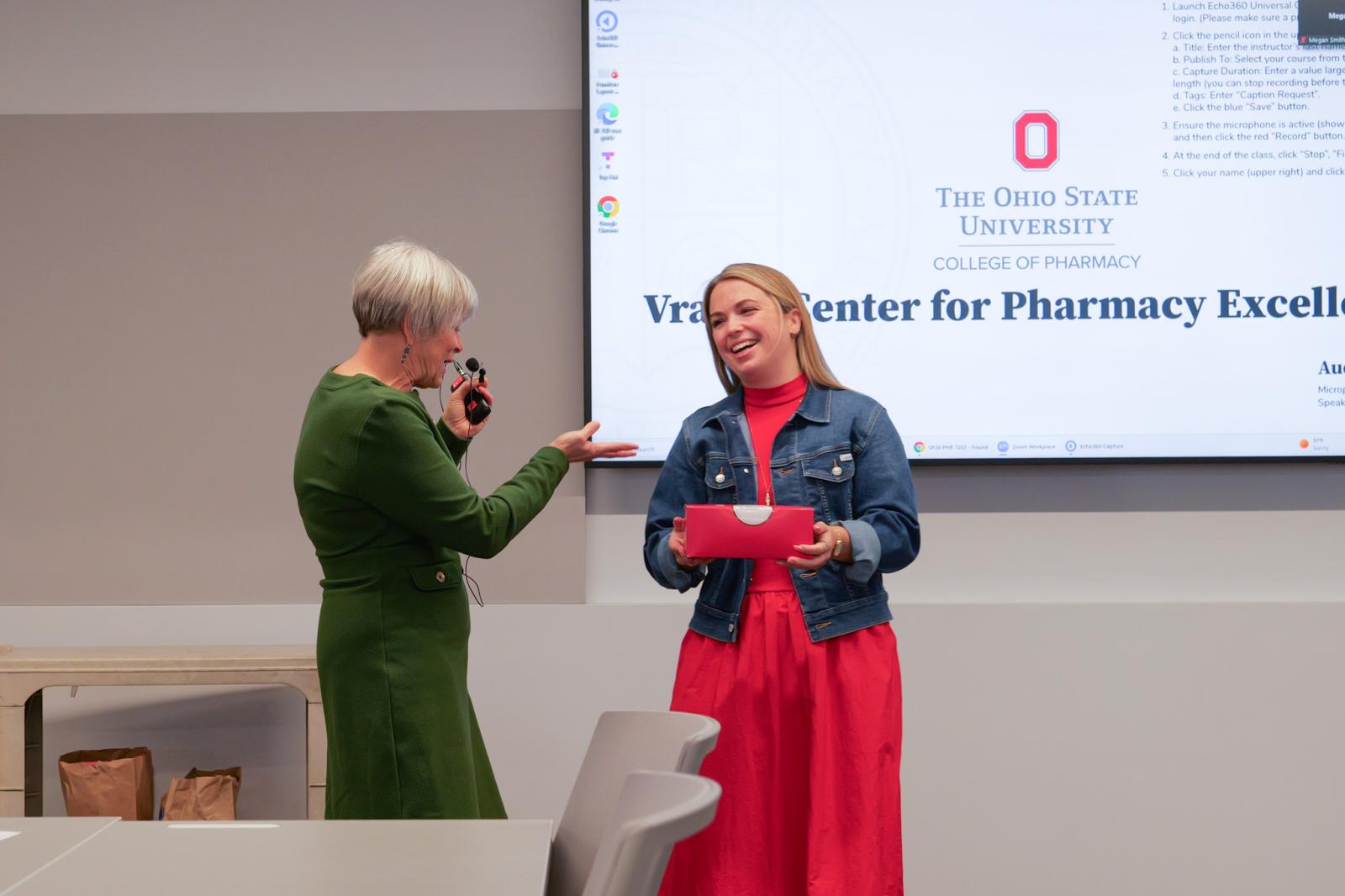 Dean Kroetz announcing her award