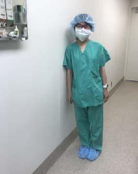 Student Yiche Huang suits up for a learning experience