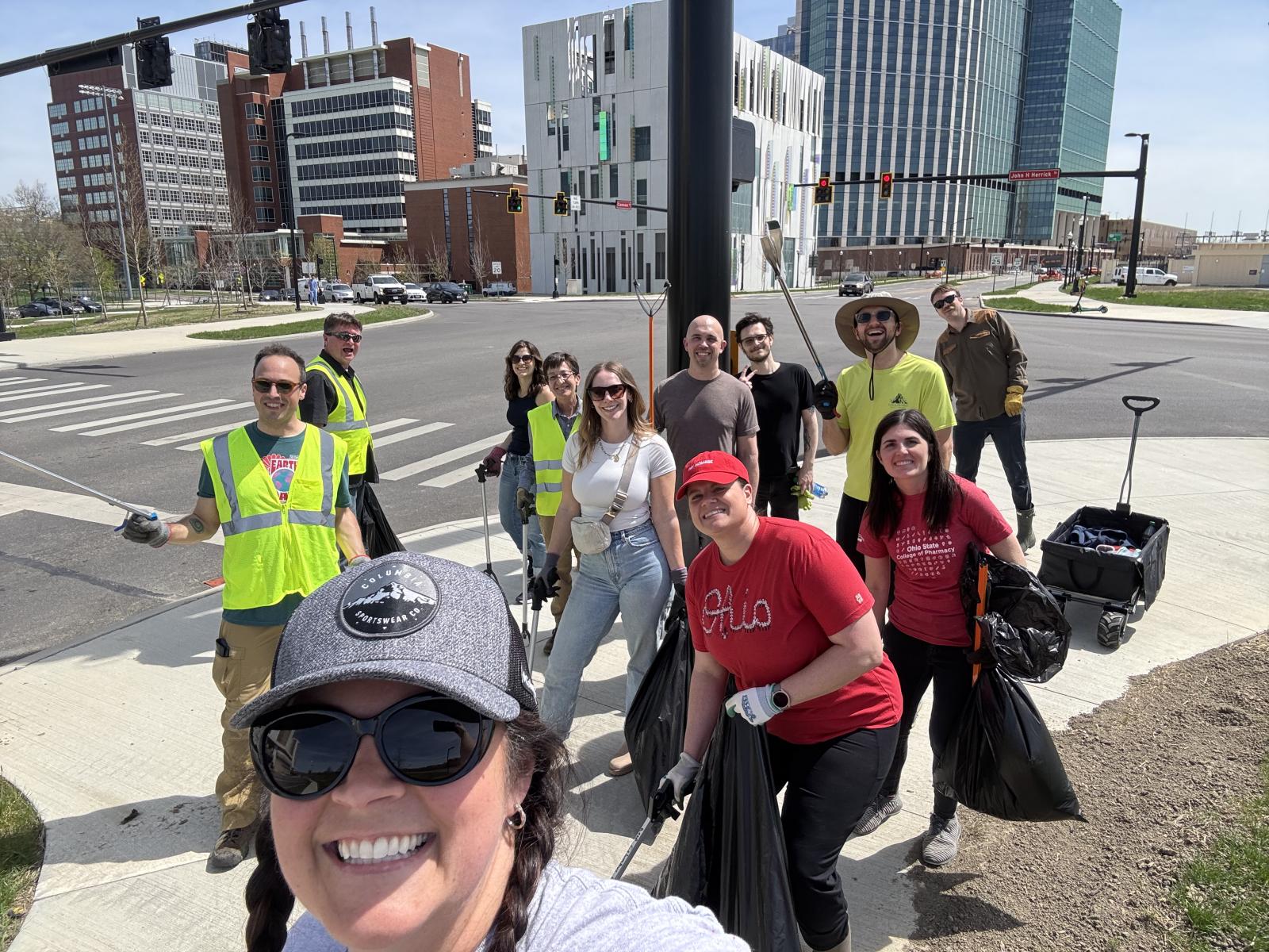 a group of people on an intersection posing
