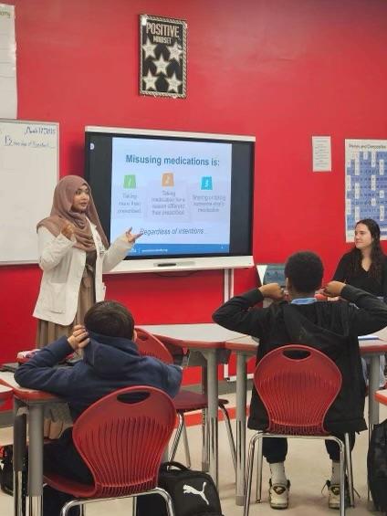 Student leading class at Sunrise Academy