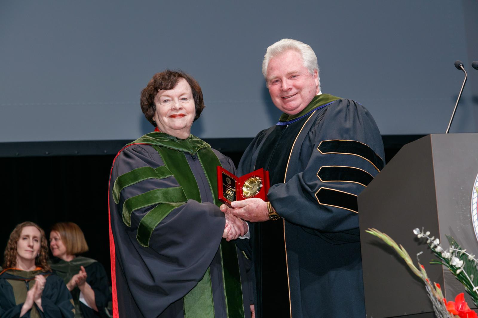 Dr. Sagraves and former dean Henry Mann, PharmD