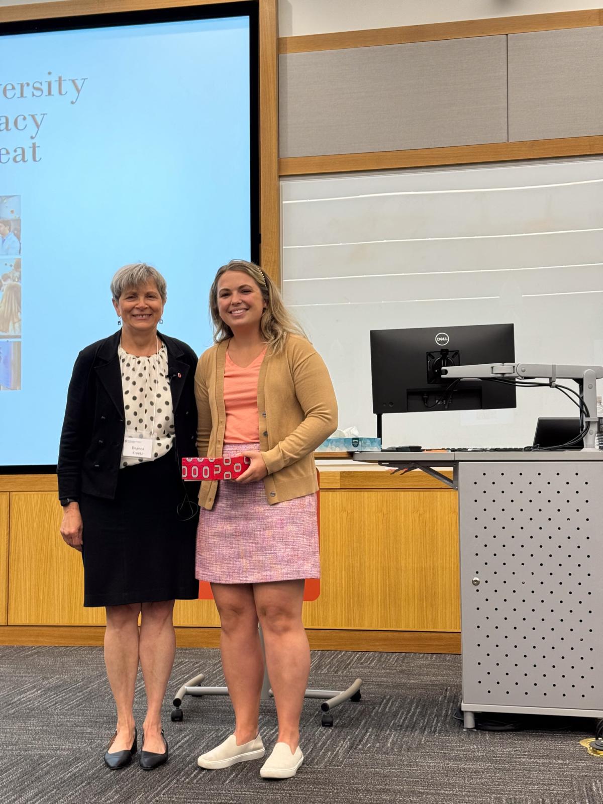 Dr. Williams receives the P2 Teaching Award from Dean Deanna Kroetz