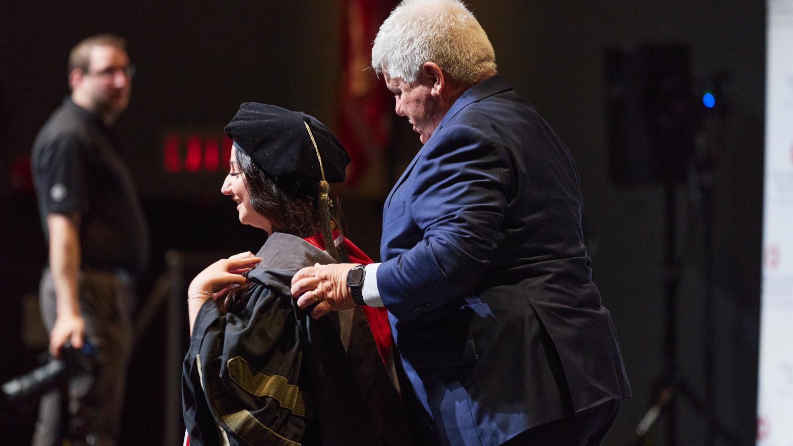 Bethany being hooded by Michael Clotz