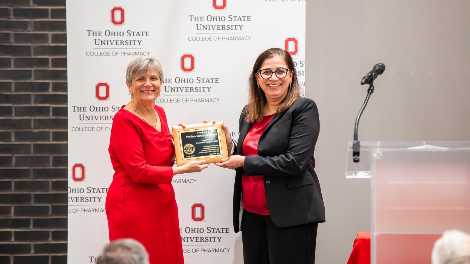 Shamina Rangwala accepting award